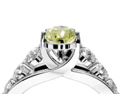 Solitaire Engagement Ring Setting for Fancy Yellow Pear-Shaped Center with Graduated Shared Prongs and Prong Head in Platinum