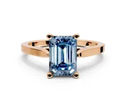 Solitaire Engagement Ring Setting for Fancy Blue Emerald Cut Center with Tapered Shoulders and Prong Head in Rose Gold