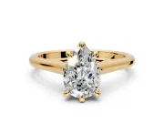 Solitaire Engagement Ring Setting for Pear-Shaped Center with Cathedral Band and Prong Head in Yellow Gold
