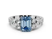 Cluster Engagement Ring Setting for Fancy Blue Emerald Cut Center with Bezel Accent Clusters and Prong Head in Sterling Silver