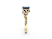 Solitaire Engagement Ring Setting for Fancy Blue Emerald Cut Center with Marquise Accent Twist Band and Prong Head in Yellow Gold