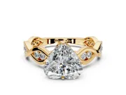 Solitaire Engagement Ring Setting for Heart-Shaped Center with Accented Twist Band and Leaf Prong Head in Yellow Gold