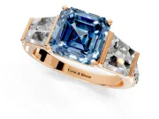 Channel-Set Engagement Ring Setting for Fancy Blue Asscher Cut Center with Baguette Band and Prong Head in Rose Gold