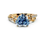 Leaf Motif Engagement Ring Setting for Fancy Blue Heart-Shaped Center with Pave Band and Prong Head in Yellow Gold