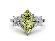 Floral Engagement Ring Setting for Fancy Yellow Marquise Center with Marquise Cluster Shoulders and Prong Head in White Gold