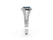 Halo Engagement Ring Setting for Fancy Blue Emerald Cut Center with Narrow Pave Split Shank and Prong Head in Platinum