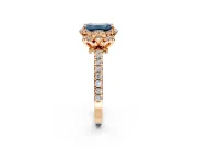 Halo Engagement Ring Setting for Fancy Blue Emerald Cut Center with Openwork Halo, Pave Band and Prong Head in Rose Gold