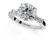 3 Stone Engagement Ring Setting for Round Cut Center with Channel Baguette Accents and Prong Head in Platinum