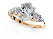 3 Stone Engagement Ring Setting for Oval Center with Large Pear-Shaped Accents and Prong Head in Rose Gold
