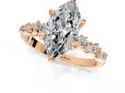 Solitaire Engagement Ring Setting for Marquise Center with Trailing Leaf Accent Band and Prong Head in Rose Gold