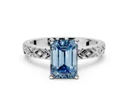 Solitaire Engagement Ring Setting for Fancy Blue Emerald Cut Center with Milgrain X Pattern Band and Prong Head in Platinum