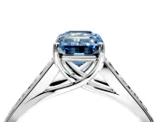 Solitaire Engagement Ring Setting for Fancy Blue Emerald Cut Center with Cathedral Channel Band and Prong Head in Platinum