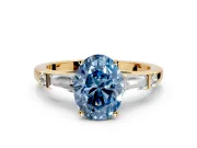 Bar-Set Engagement Ring Setting for Fancy Blue Oval Center with Tapered Baguette Accents and Prong Head in Yellow Gold