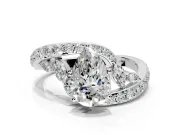 Solitaire Engagement Ring Setting for Pear-Shaped Center with Pave Bypass Twist Band and Prong Head in Platinum