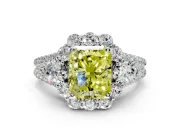 Halo Engagement Ring Setting for Fancy Yellow Radiant Cut Center with Two-Strand Split Shank and Prong Head in Platinum