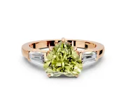 3 Stone Engagement Ring Setting for Fancy Yellow Heart-Shaped Center with Baguette Accents and Prong Head in Rose Gold