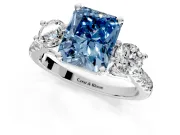 3 Stone Engagement Ring Setting for Fancy Blue Radiant Cut Center with Crossover Basket, Pave Band and Prong Head in Sterling Silver