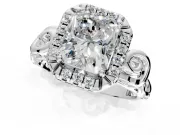 Halo Engagement Ring Setting for Radiant Cut Center with Open Scroll Shoulders and Prong Head in Platinum