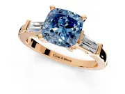 3 Stone Engagement Ring Setting for Fancy Blue Cushion Cut Center with Channel Baguette Accents and Prong Head in Rose Gold