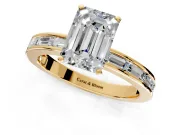 Solitaire Engagement Ring Setting for Emerald Cut Center with Channel Baguette Band and Prong Head in Yellow Gold