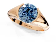 Tension Engagement Ring Setting for Fancy Blue Round Cut Center with Wide Tapered Band and Tension Head in Rose Gold