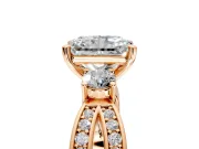 3 Stone Engagement Ring Setting for Radiant Cut Center with Pave Twist Band and Prong Head in Rose Gold