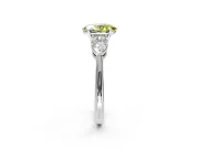 3 Stone Engagement Ring Setting for Fancy Yellow Oval Center with Large Pear-Shaped Accents and Prong Head in Platinum