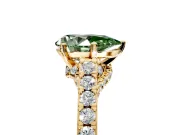 Solitaire Engagement Ring Setting for Fancy Green Pear-Shaped Center with Crossover Accents and Prong Head in Yellow Gold
