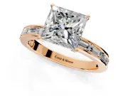 Solitaire Engagement Ring Setting for Princess Cut Center with Channel Baguette Band and Prong Head in Rose Gold