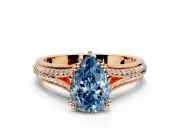 Solitaire Engagement Ring Setting for Fancy Blue Pear-Shaped Center with Pave Rail Split Shank and Prong Head in Rose Gold
