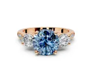 3 Stone Engagement Ring Setting for Fancy Blue Round Cut Center with Crossover Basket, Pave Band and Prong Head in Rose Gold
