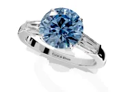 3 Stone Engagement Ring Setting for Fancy Blue Round Cut Center with Baguette Accents and Prong Head in Platinum