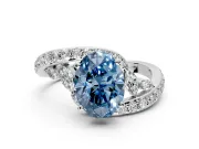 Solitaire Engagement Ring Setting for Fancy Blue Oval Center with Pave Bypass Twist Band and Prong Head in Sterling Silver