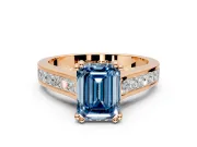 Solitaire Engagement Ring Setting for Fancy Blue Emerald Cut Center with Channel Band and Double Claw Prong Head in Rose Gold