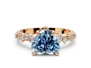 Solitaire Engagement Ring Setting for Fancy Blue Heart-Shaped Center with Trailing Leaf Accent Band and Prong Head in Rose Gold