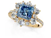Floral Halo Engagement Ring Setting for Fancy Blue Princess Cut Center with Pave Accents and Prong Head in Yellow Gold