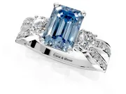 3 Stone Engagement Ring Setting for Fancy Blue Emerald Cut Center with Pave Twist Band and Prong Head in Platinum