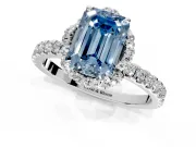 Halo Engagement Ring Setting for Fancy Blue Emerald Cut Center with Openwork Halo, Pave Band and Prong Head in Platinum