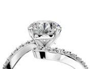 Solitaire Engagement Ring Setting for Round Cut Center with Pave Bypass Swirl Band and Prong Head in Sterling Silver