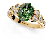 Cluster Engagement Ring Setting for Fancy Green Oval Center with Bezel Accent Clusters and Prong Head in Yellow Gold