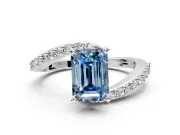 Solitaire Engagement Ring Setting for Fancy Blue Emerald Cut Center with Pave Bypass Swirl Band and Prong Head in Platinum