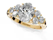 Cluster Engagement Ring Setting for Oval Center with Round Cut Accent Frame and Prong Head in Yellow Gold