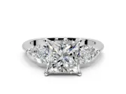 3 Stone Engagement Ring Setting for Princess Cut Center with Large Pear-Shaped Accents and Prong Head in Platinum