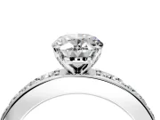 Solitaire Engagement Ring Setting for Oval Center with Channel-Set Accents and Prong Head in Sterling Silver