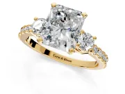 3 Stone Engagement Ring Setting for Radiant Cut Center with Round Cut Side Accents and Prong Head in Yellow Gold