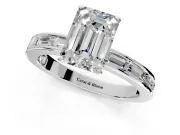 Solitaire Engagement Ring Setting for Emerald Cut Center with Channel Baguette Band and Prong Head in Platinum