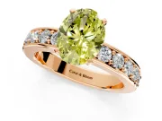 Solitaire Engagement Ring Setting for Fancy Yellow Oval Center with Channel-Set Accents and Prong Head in Rose Gold