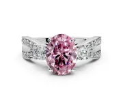 3 Stone Engagement Ring Setting for Fancy Pink Oval Center with Pave Twist Band and Prong Head in Platinum