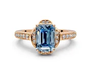 Floral Engagement Ring Setting for Fancy Blue Emerald Cut Center with Four Accent Clusters and Prong Head in Rose Gold