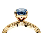 Solitaire Engagement Ring Setting for Fancy Blue Emerald Cut Center with Marquise Panel Band and Prong Head in Yellow Gold
